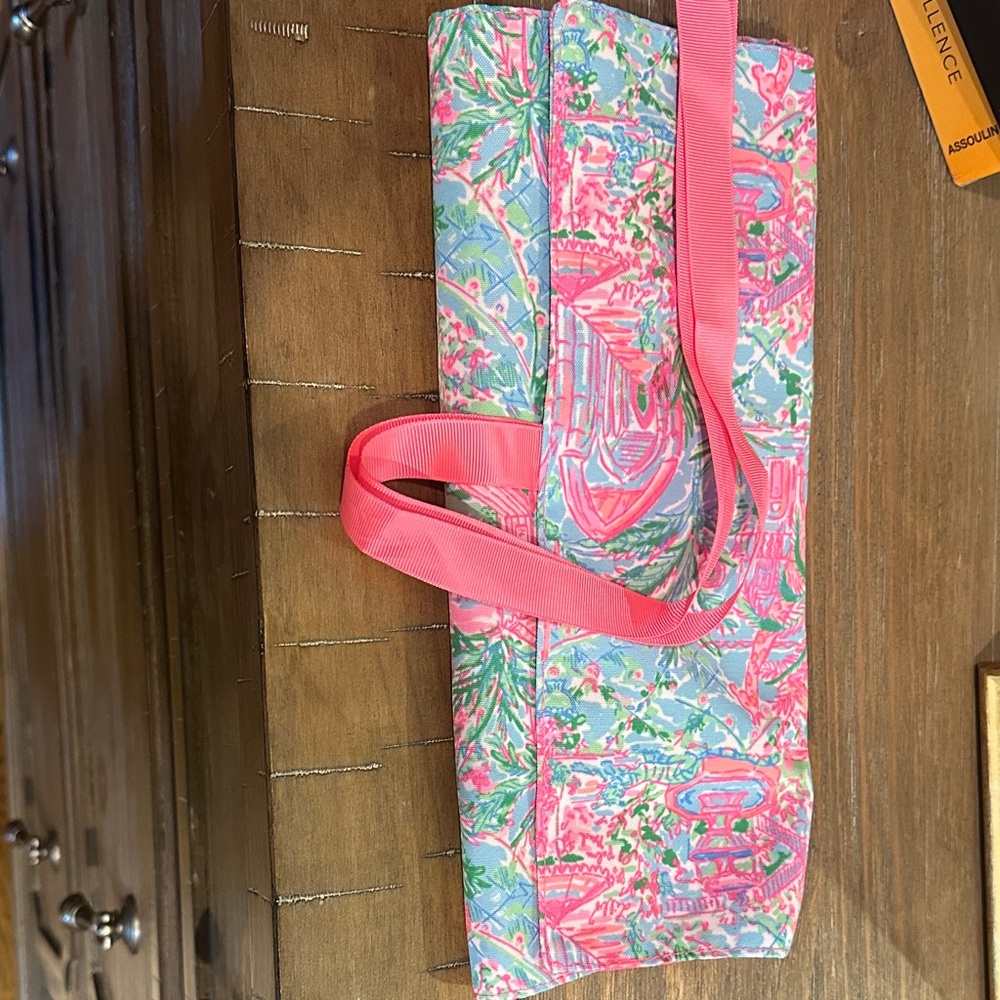 Lilly Pulitzer toiletry bag
Included brushes never used 
Zipper pouch